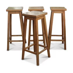 Four walnut bar stools