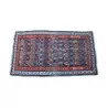 Un tapis bleu rouge Pakistan/afghan. - Moinat - Tapis