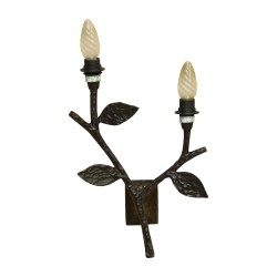 A tree branch wall light.