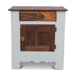 A painted wood jam cabinet.
