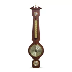 A wooden barometer.