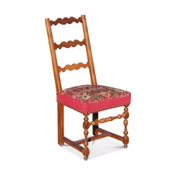 一把路易八世胡桃木椅子。