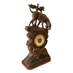Un baromètre Brienz en bois sculpté "chien et renard".