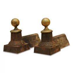 Pair of Directoire andirons with cast iron and bronze balls.