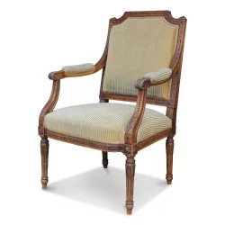 Louis XVI armchair in carved beech.