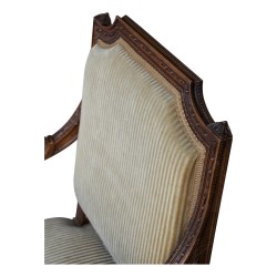 Louis XVI armchair in carved beech.