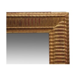 Miroir cannelé.