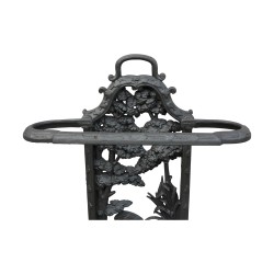 Cast iron umbrella holder.