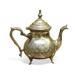 A silver metal teapot. Italian work.