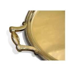 A silver metal tray with pearl decor.