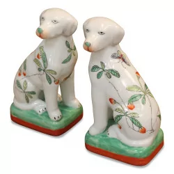 A pair of “Delft” porcelain dogs with flower decor.