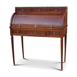 A cylindrical desk in mahogany and marble top