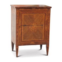A small inlaid chest of drawers.