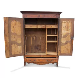 a walnut cabinet with two doors, a drawer