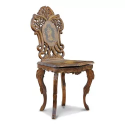 A carved wooden Brienz chair