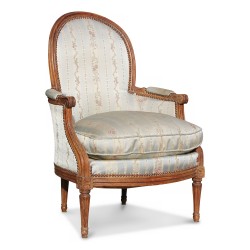 A Louis XVI gondola bergere in walnut