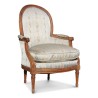 A Louis XVI gondola bergere in walnut - Moinat - Armchairs