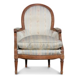 A Louis XVI gondola bergere in walnut