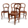 Four Louis Philippe cane chairs in walnut. - Moinat - Chairs