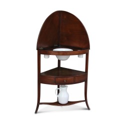 A corner corner washbasin in mahogany
