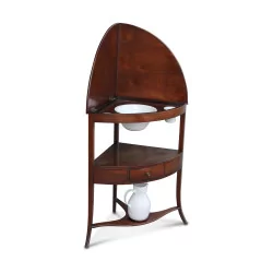 A corner corner washbasin in mahogany