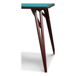 A mahogany game table with a double-sided top.