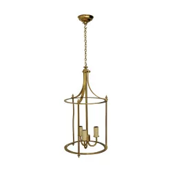 A three-light brass chandelier with curved glass