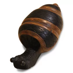 A snail carved in ebony