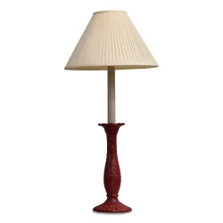 A red porcelain base lamp
