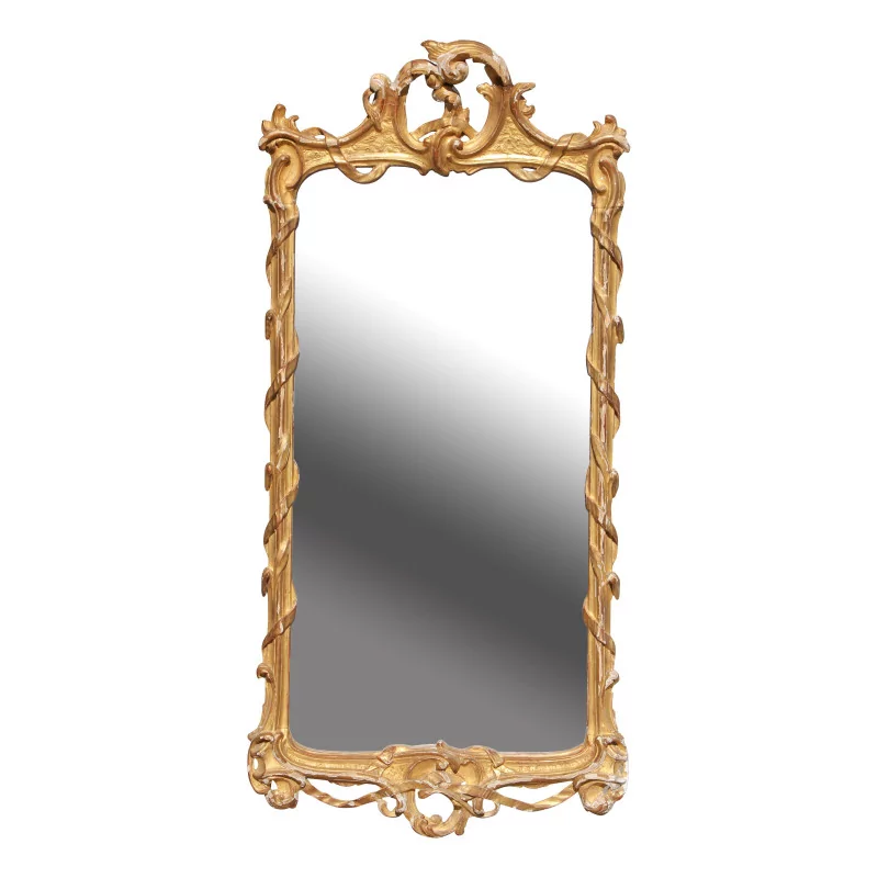 Un miroir en bois doré sculpté - Moinat - Glaces, Miroirs
