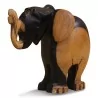 Un petit éléphant sculpé en bois d’ébène à deux tons - Moinat - Accessoires de décoration