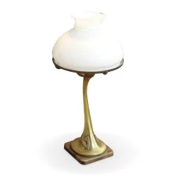 Une lampe Liberty en bronze deux lumières