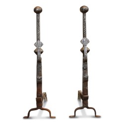 A pair of cast iron andirons. Haute Epoque