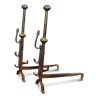 A pair of cast iron andirons. Haute Epoque - Moinat - Firedogs, Andirons