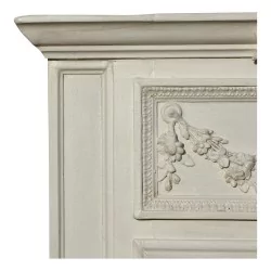 Un miroir cadre bois patine blanc