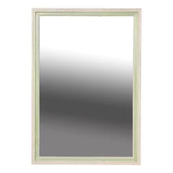 A wooden frame mirror with white and green patina