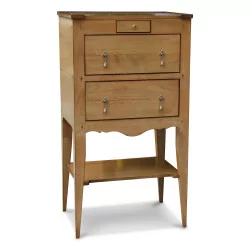 A high chest of drawers in patinated cherry