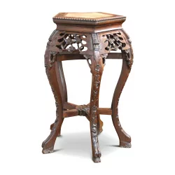 A large carved wooden Chinese stand