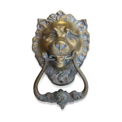 A lion head door knocker