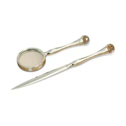 A letter opener and diamond magnifying glass