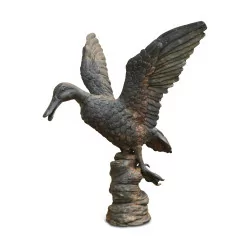 Un canard à l’envol en bronze Japon