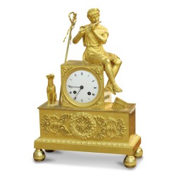 Eine Uhr „Der Flötenspieler und der Hund mit der Schleife“