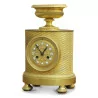 Eine vergoldete Bronzeuhr im Empire-Stil - Moinat - Tischuhren