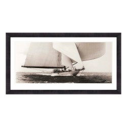A \"Sailboat\" painting under glass with a wooden frame