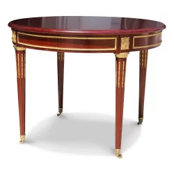 Une table de salle à manger en acajou de style Louis XVI