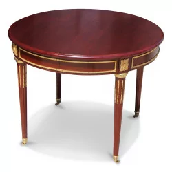 A Louis XVI style mahogany dining table