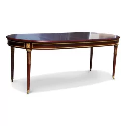 A Louis XVI style mahogany dining table