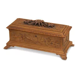 A carved wooden Brienz music box