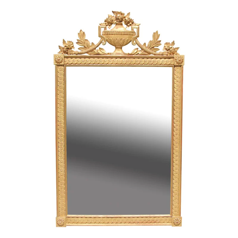 Un miroir en bois sculpté et doré de style Louis XVI - Moinat - Glaces, Miroirs