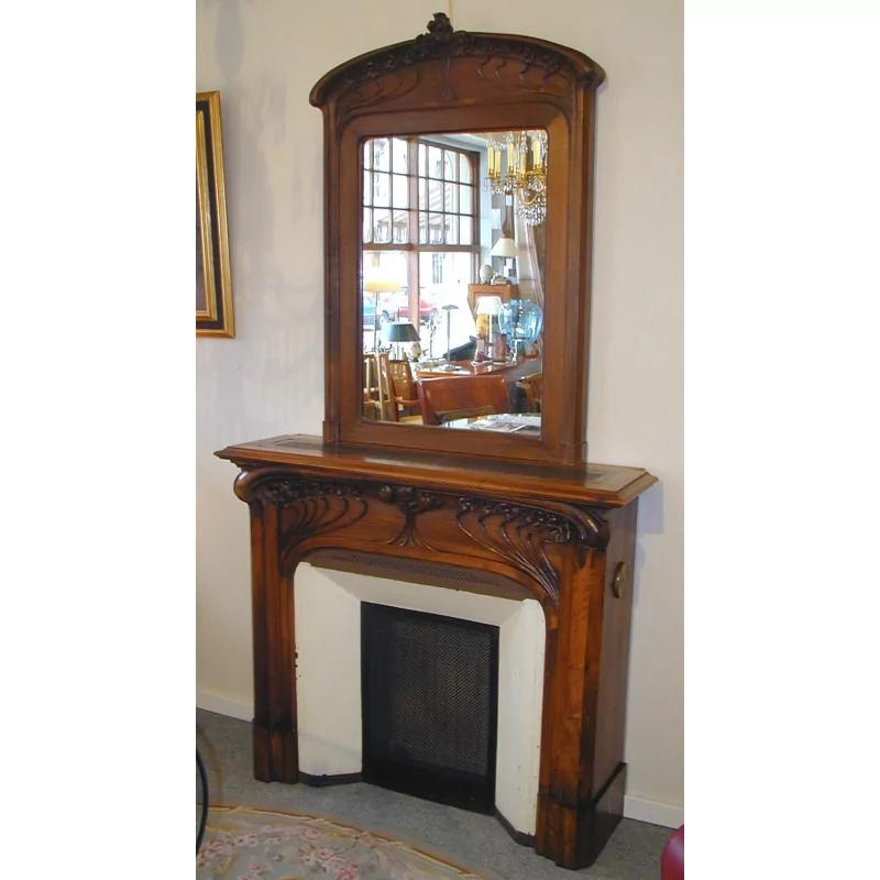 Fireplace and its art nouveau mirror in carved walnut, in the - Moinat - Uncategorized Fireplace and its art nouveau mirror in carved walnut, in the - Moinat - Uncategorized